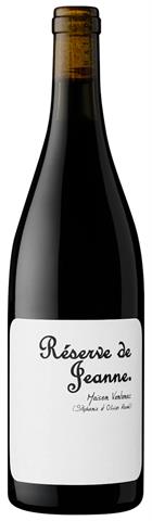 wine bottle with a name on a white label