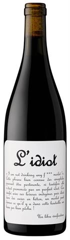 wine bottle with a name on a white label