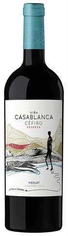 wine bottle with a man standing in front of mountains on a white label