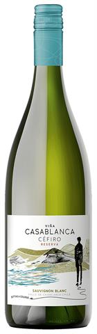 wine bottle with a man standing in front of mountains on a white label