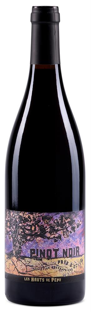 wine bottle with a tree on a purple label