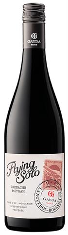 wine bottle with an airplane on a white label