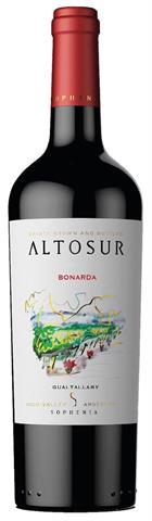 wine bottle with a painting of a vineyard on a white label